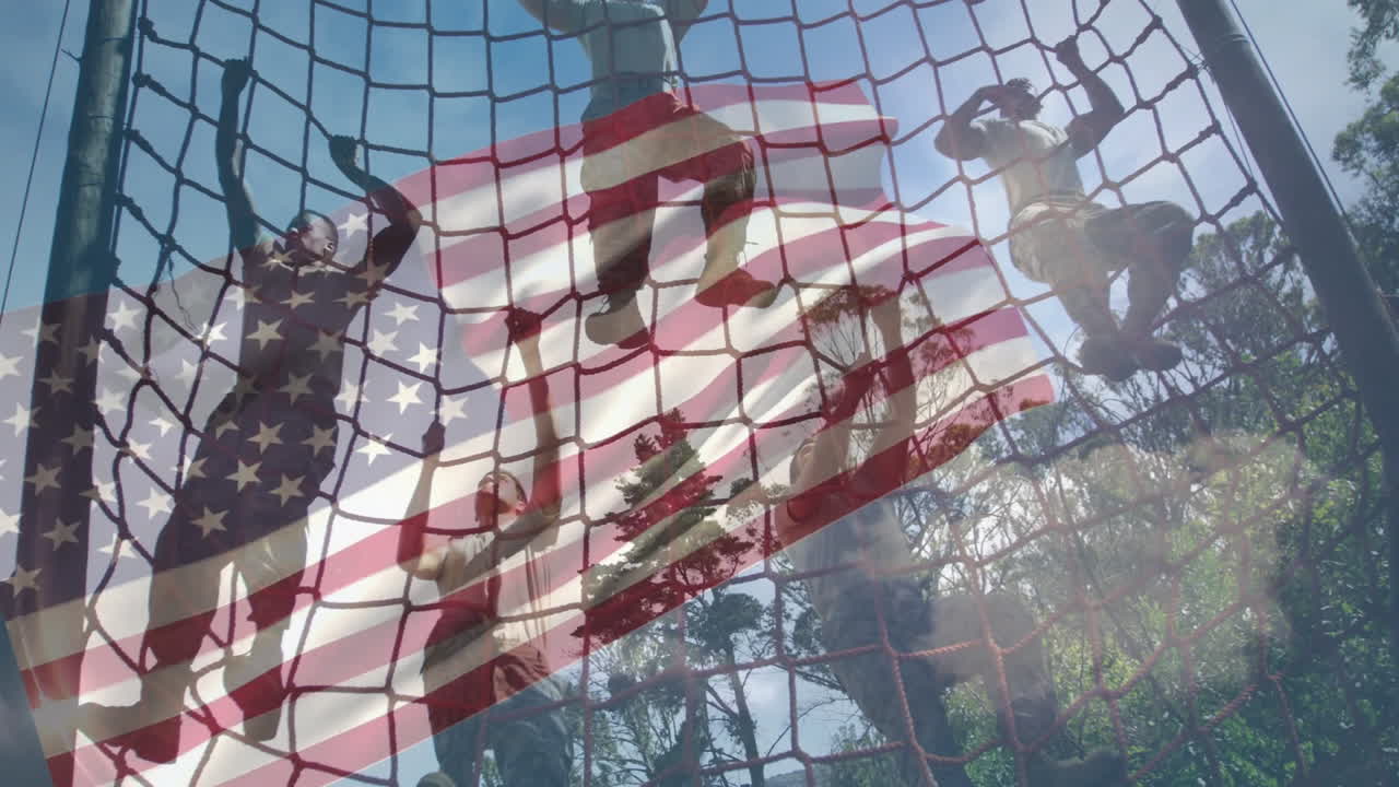 Climbing net with American flag animation overlay against blue sky, people silhouetted