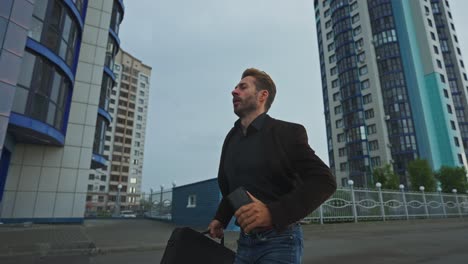businessman running late in city