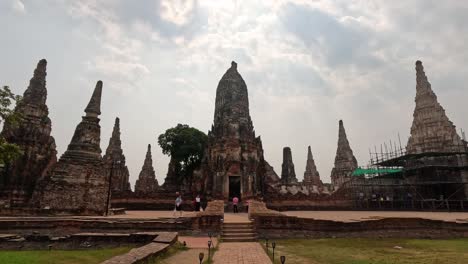 tourists visiting historic temple complex ruins