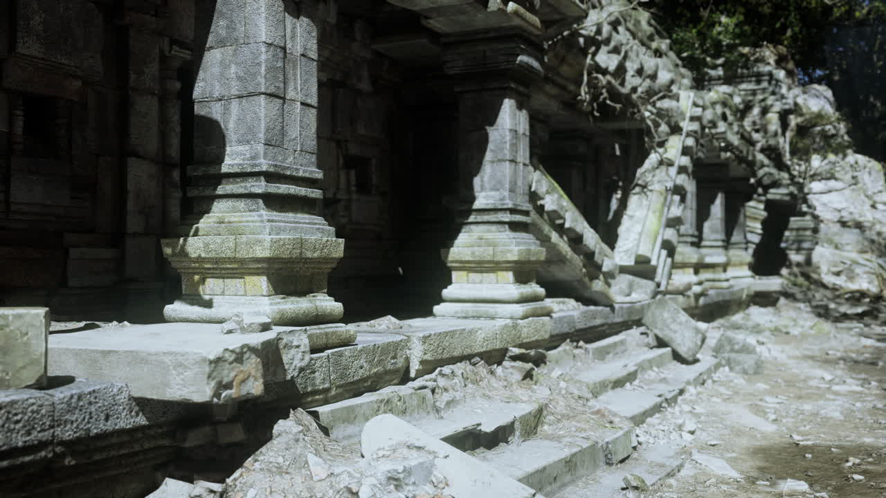 Ancient temple ruins in cambodia showcasing intricate stone pillars and steps