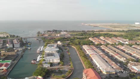 malacca aerial view at sunset. sky colors over melaka city skyscrapers. aerial footage of historical malacca city in the morning