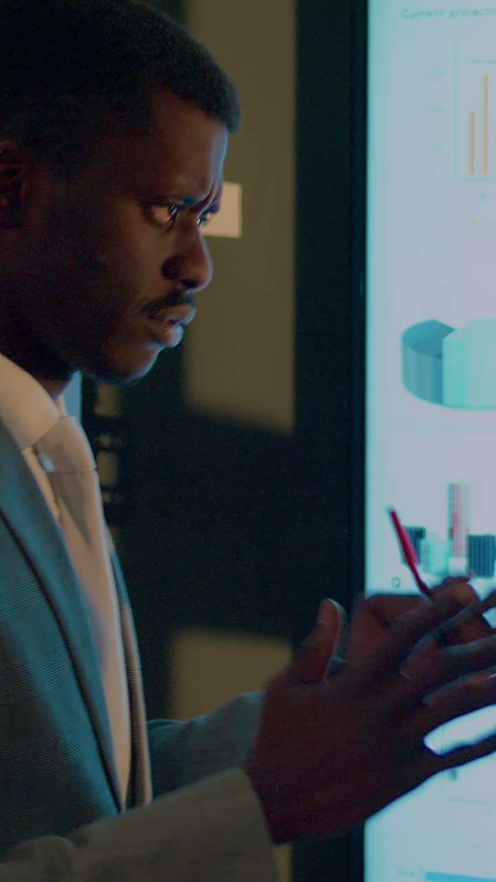 Vertical video Employees working on business charts