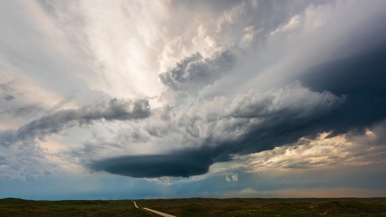 Spinning supercell storm cloud beautiful sunset severe weather