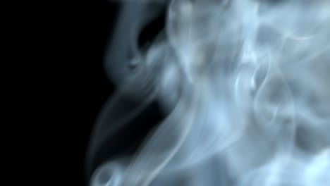 jet of smoke on black background.