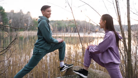 couple stretching outdoors