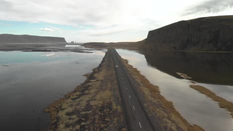 flyover shot of a stunning road in iceland