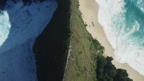 majestic kelingking beach: aerial 4k drone footage of the iconic t-rex cliff, bali