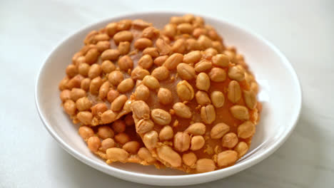 thai fried peanut cookies on plate