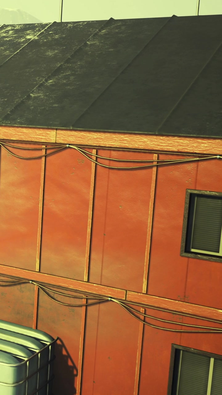 Building with red exterior and power lines during daylight in urban area