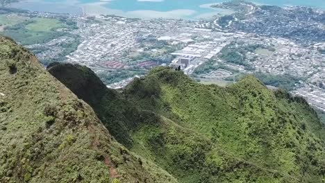 drone aerial mountain pan up hawaii green forest