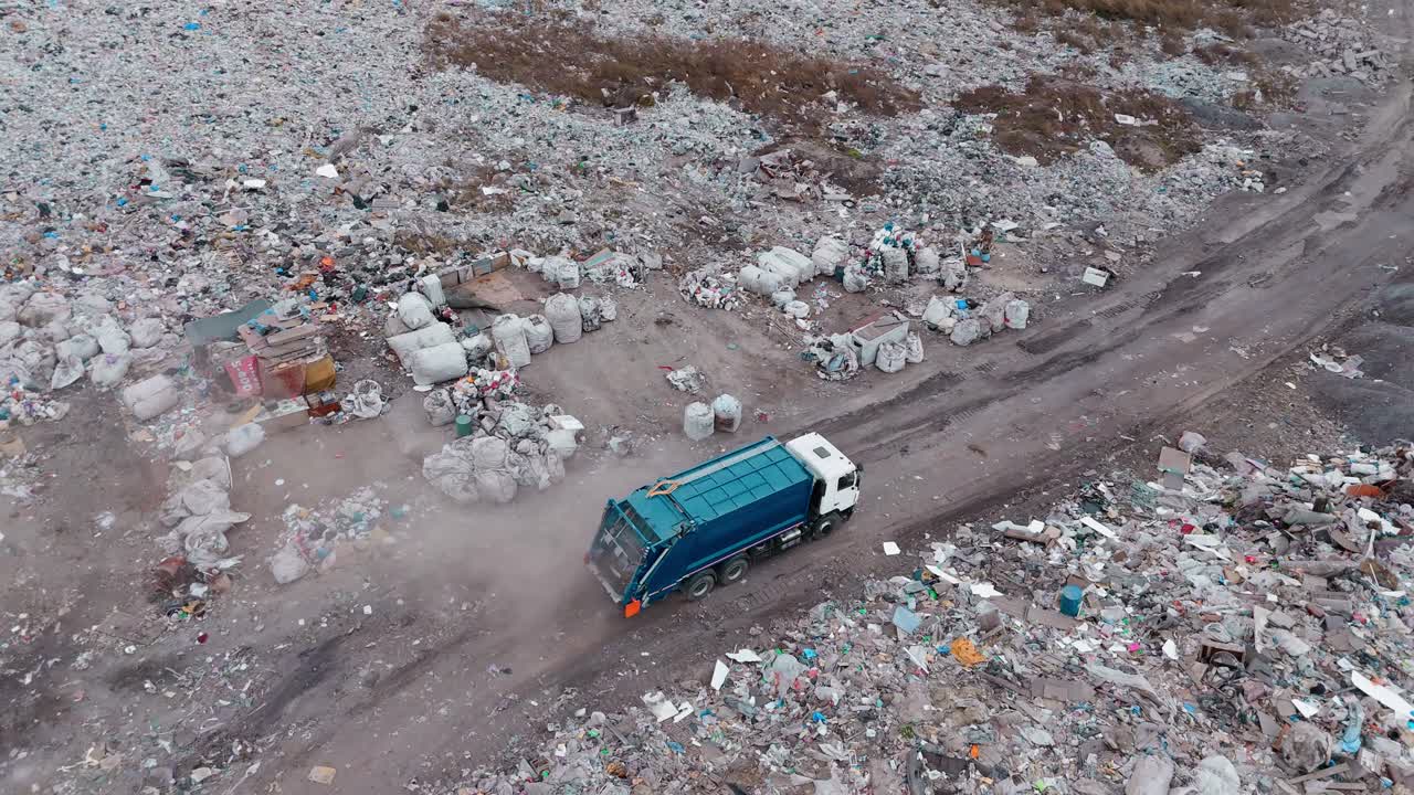 Aerial View of a Landfill with Garbage Truck