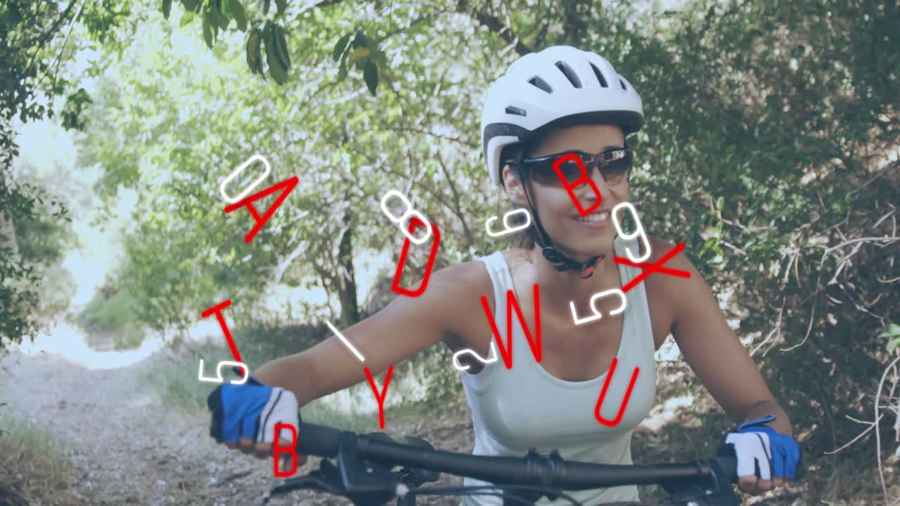 Female cyclist stepping behind bike on forest trail gripping handlebars and pushing to start ride