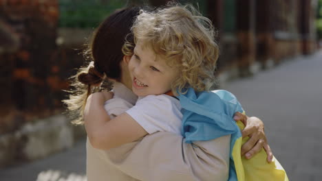 Mother Hugging Child