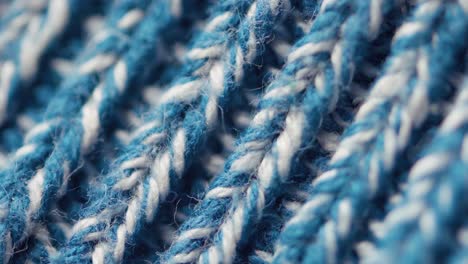 la textura del suéter de hilo de melange azul