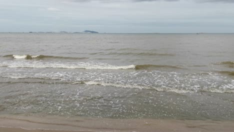 Close-Up-of-Bangsaen-Beach-Along-the-Seashore-in-Thailand