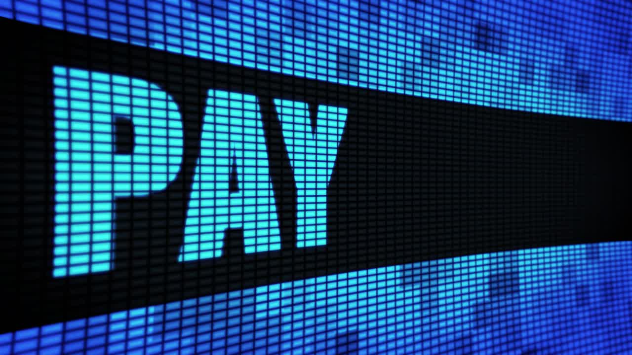 LED Screen Display Showing "PAY"