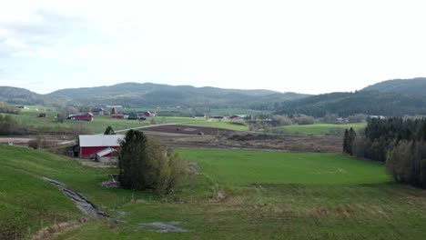 flying above agricultural landscape in rural town indre fosen in norway