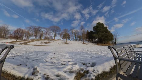 winter timelapse during sunset near waterfront low angle with snow