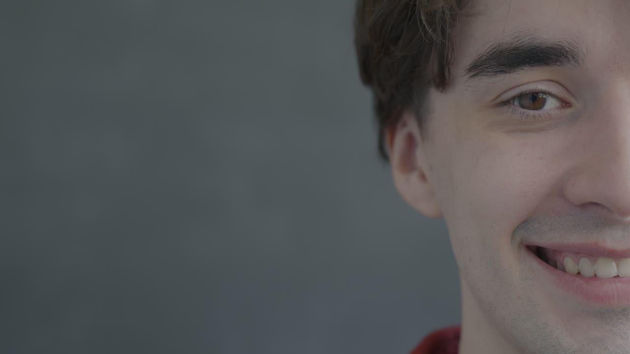 Close-up of a smiling young man