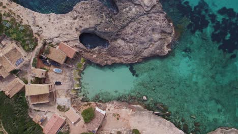 top down of s'almonia beach mallorca small houses at bay, aerial