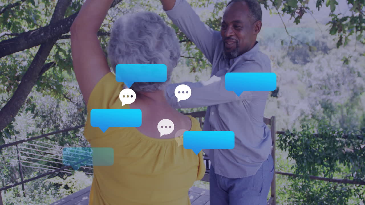 animación de iconos de los medios sobre una pareja biracial bailando