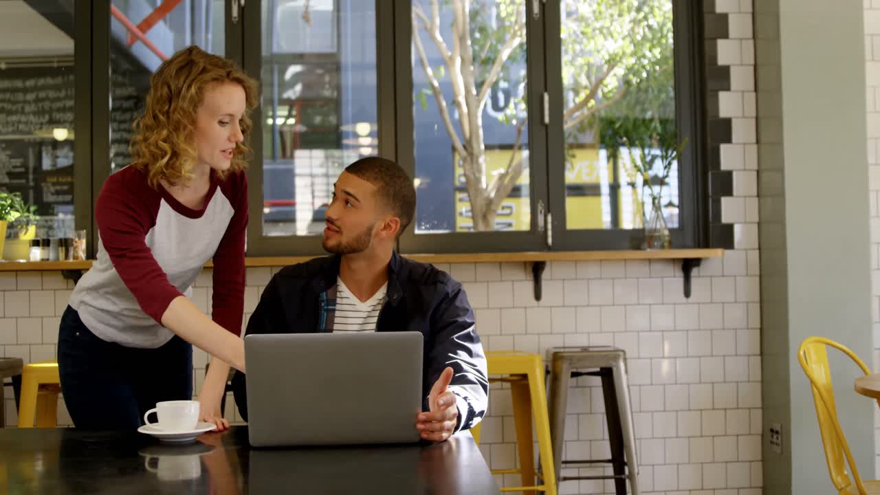 Executives discussing over laptop 4k