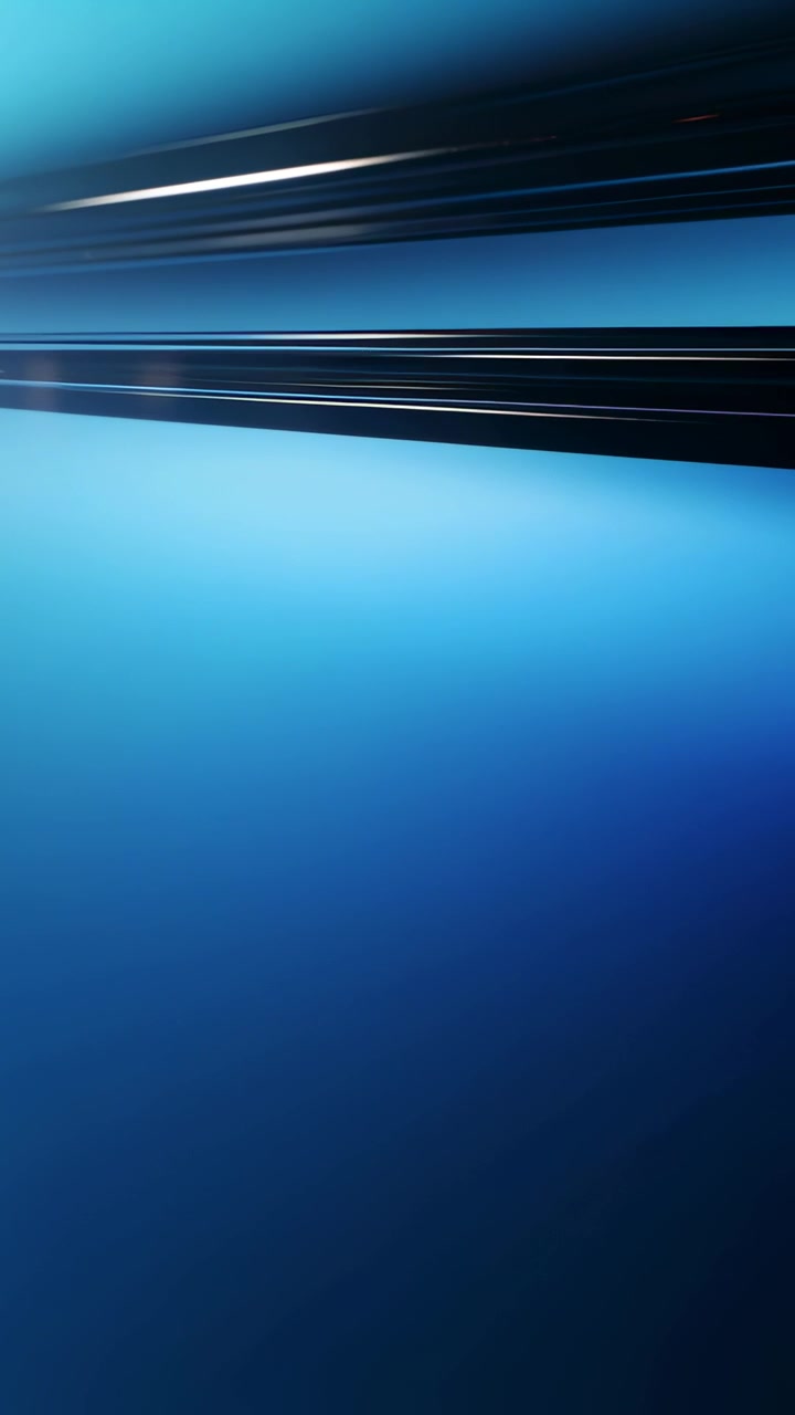 Video verticale: Due bande scure scorrono in studio, rivelando linee sottili e testo piccolo su uno sfondo sfumato blu.