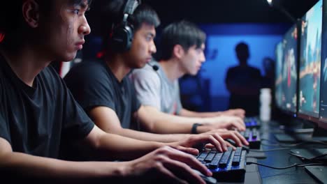 intense gaming session: focused players competing in a high-stakes electronic environment with headsets and gaming gear