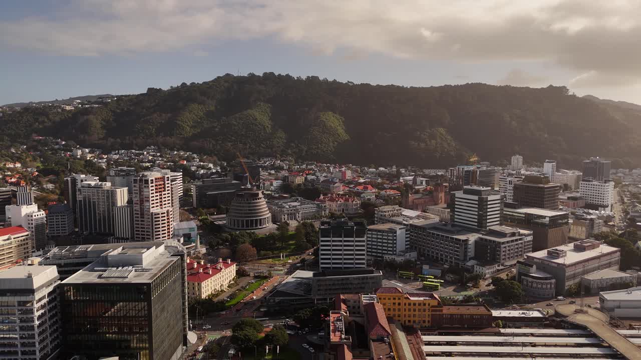 Breathtaking 4K drone footage captures a panoramic view of Wellington Port, showcasing the busy harbor and urban landscape of New Zealand's capital city