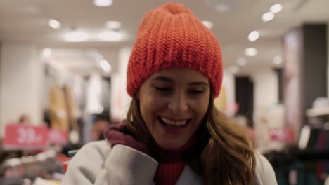 woman with big smile on her face after big shopping