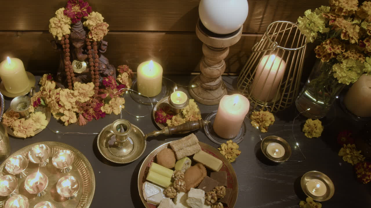 Hindu Deity with Offerings and Candles