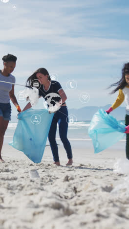 Animation-of-globe-icons-over-diverse-female-and-male-volunteers-picking-up-rubbish-on-beach