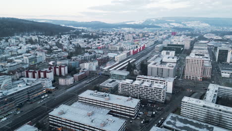 Static-shot-over-industrial-are-with-the-focus-falling-on-the-train-transport