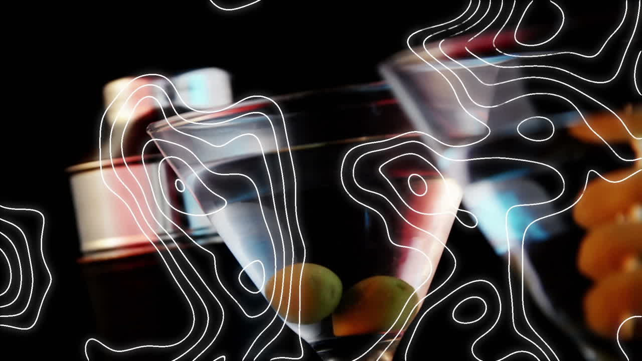 Animation of white lines over cocktail glasses with olives on black background