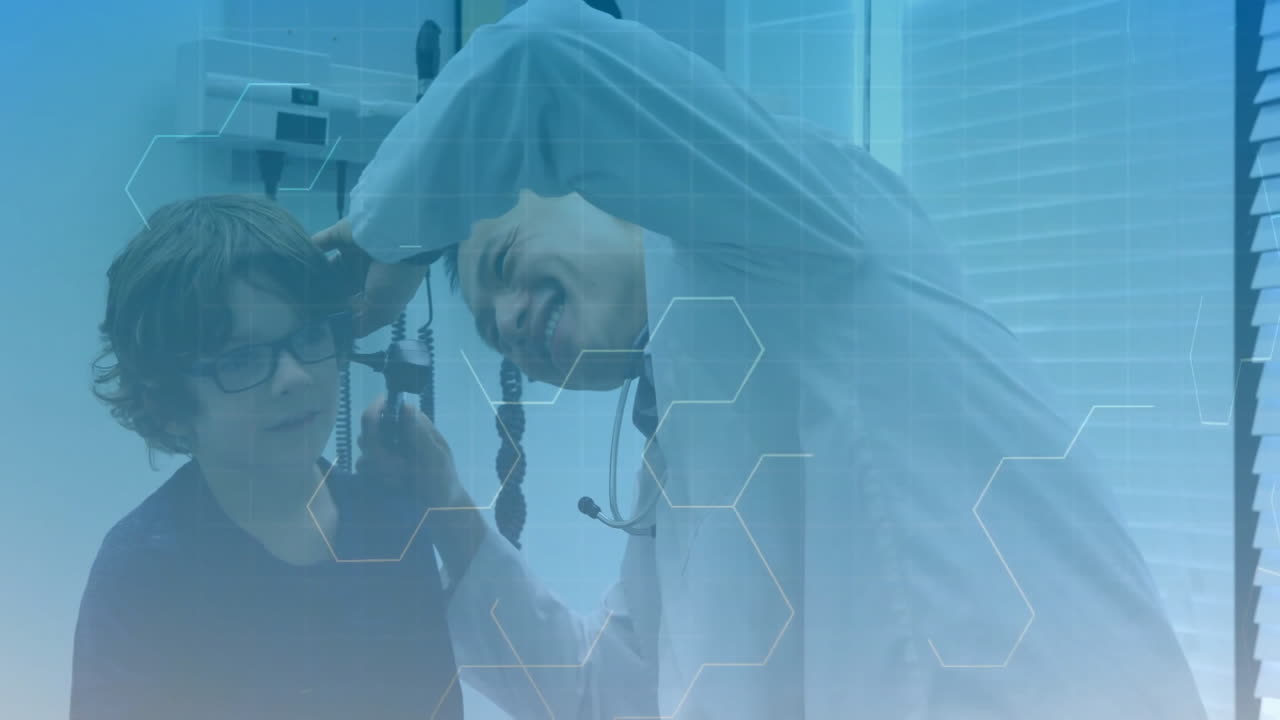 male doctor using otoscope with patient in medical clinic, with animated ear graphic and data chart