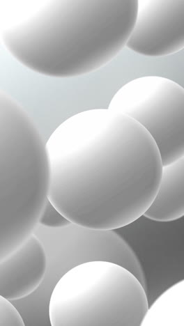 abstract realistic 3d gray background with white sphere balls flying on air. loop motion graphic. vertical video.