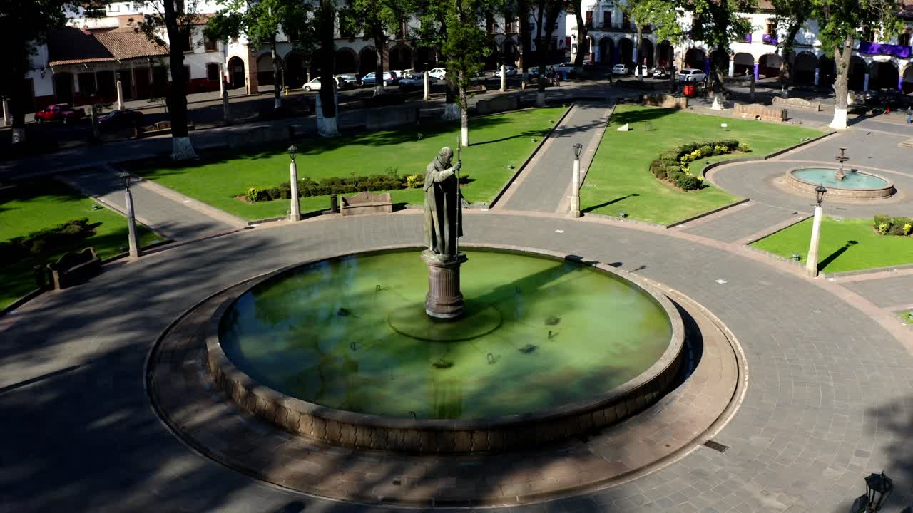 DRONE ORBIT SHOT OF DOWN TOWN PLAZA IN PATZCUARO MICHOACAN