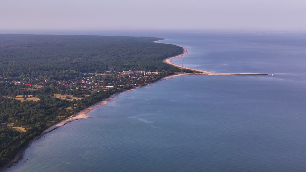 Coastal Aerial View of a Town and Pier