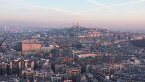 aerial view of paris montmartre sacred heart france sunset pollution in the sky