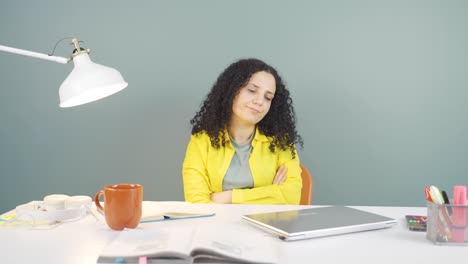 Young-woman-closing-laptop-with-angry-expression.