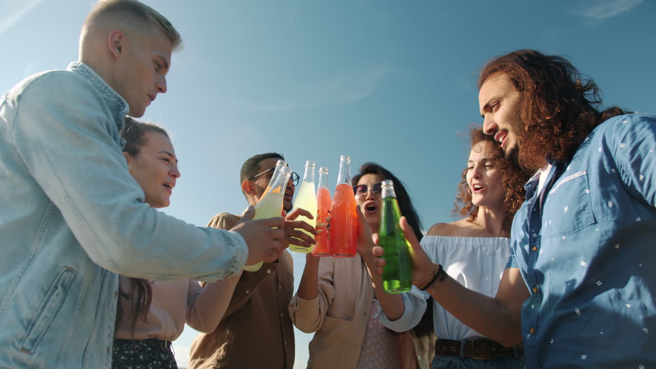 Friends Toasting with Colorful Drinks