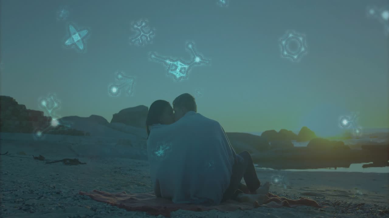 ビーチでキスしようと身を寄せ、そして引き離すカップル。その抱擁の周りにはホログラフィックなテクノロジーの形状が形成されている。