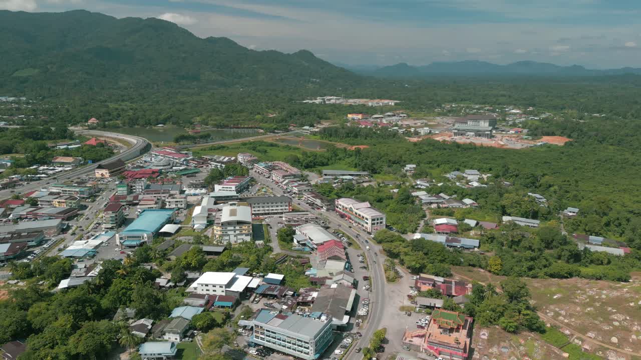 Aerial Drone View, Serian District Town ,Summer With Beautiful Green Trees,New Building And Water Park Lake, Water From The Mountain Sarawak,Borneo.