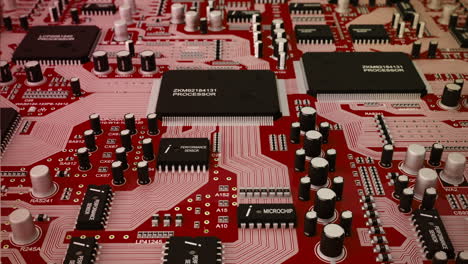 Loopable-fly-over-motherboard-with-multiple-circuits-and-electronic-hardware,-semiconductors,-transistors,-microchips,-Includes-processor-and-illustrates-technology,-hardware-and-computer-components.