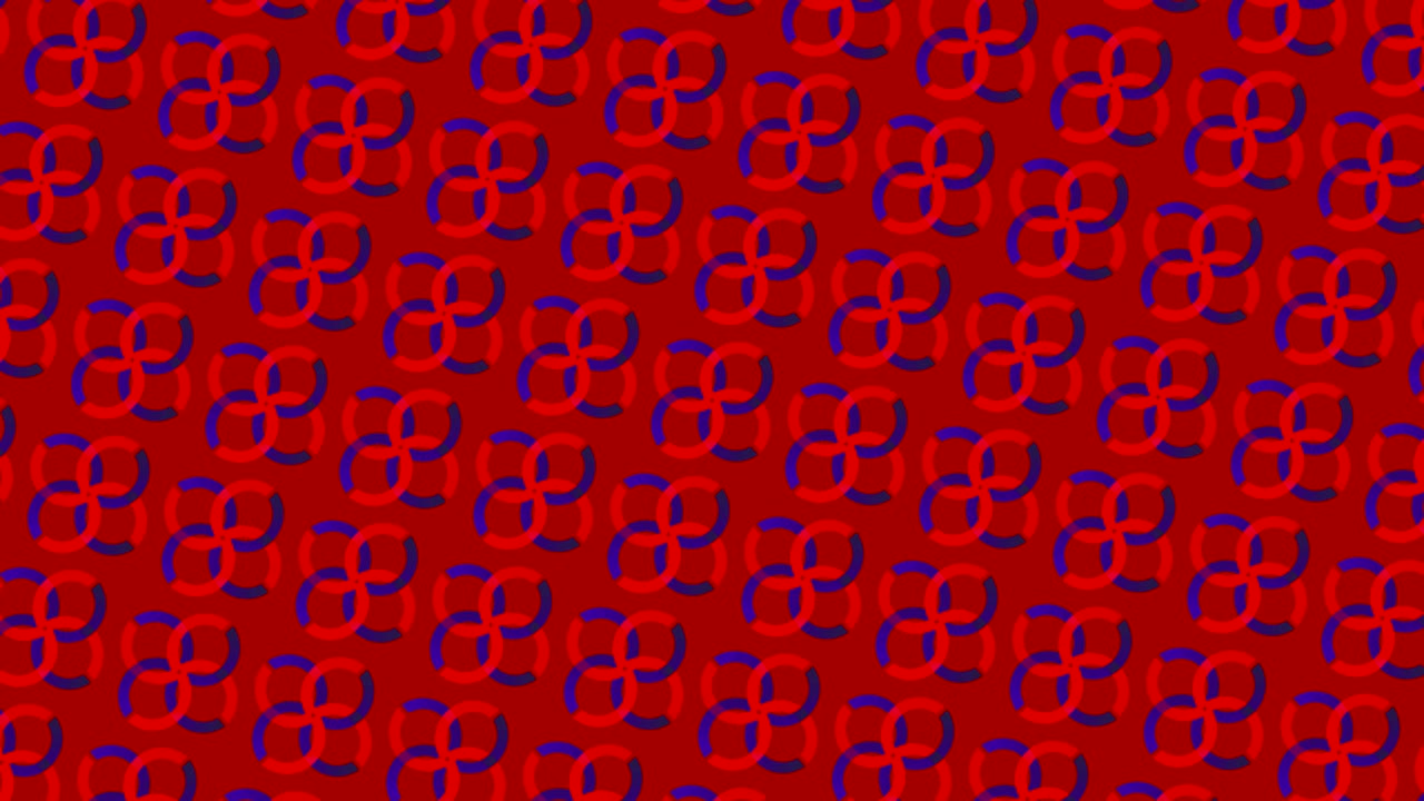 Graphic pattern that quickly changes color as it rotates clockwise and then anticlockwise, creating a hypnotic and stroboscopic effect.