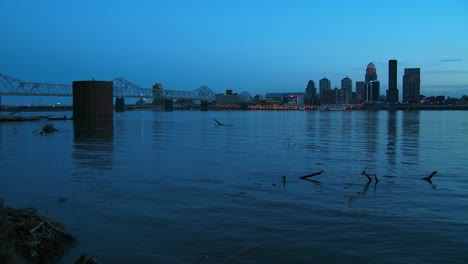 Beautiful-shot-of-Louisville-Kentucky-across-the-Ohio-River-at-night