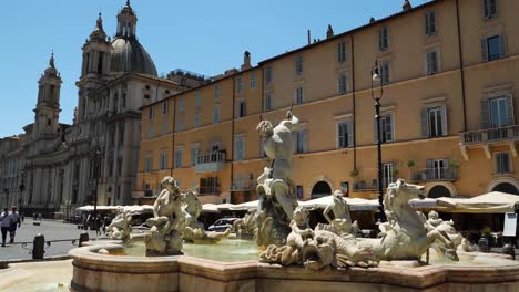 fountain of the neptune and sant'agnese in agone church in background, piazza navona, rome, italy