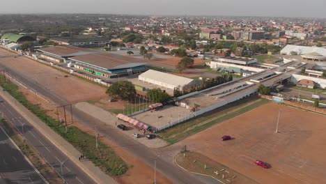 ghana trade fair wide aerial track backwards wide