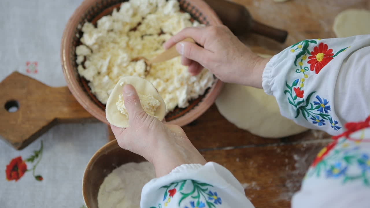 Making of cheese dumpling. Cook prepare traditional Ukrainian cuisine