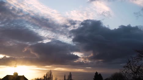 stratocumulus cloud forming at sunset sky time lapse sun rays